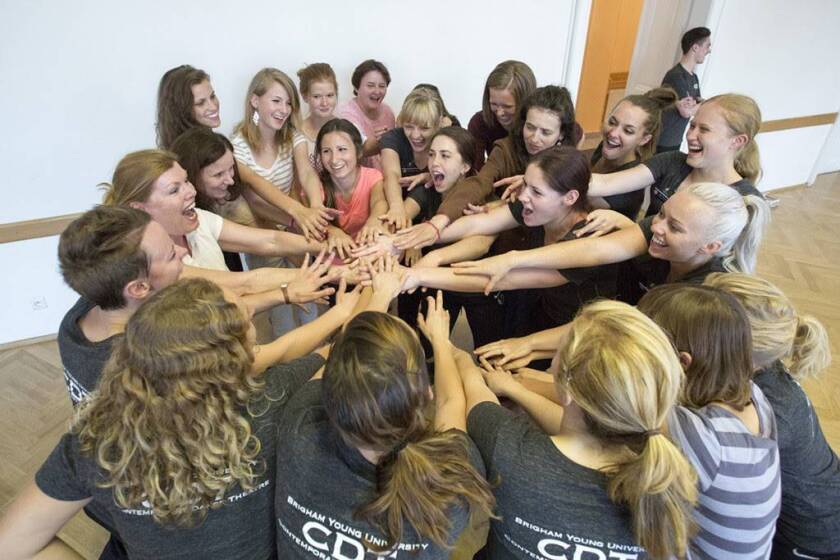 Members of Contemporary Dance Theatre cheer with members of the Prague, Czech Republic LDS Branch.