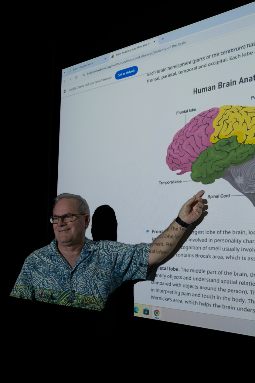 Professor Jesse Kohlert teaching a class.