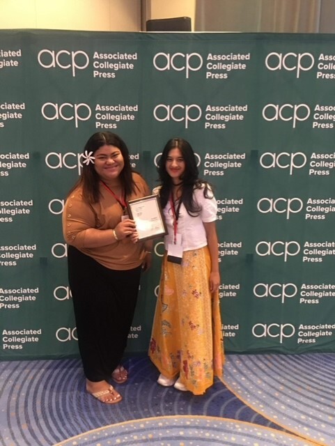 Two BYUH Ke Alaka'i employees at the convention awards ceremony.