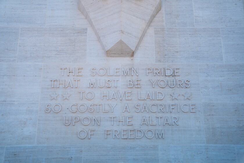 A close up of a quote from Abraham Lincoln to a woman who had lost sons during a war. "The solemn pride that must be yours to have laid so costly a sacrifice upon the alter of Freedom."