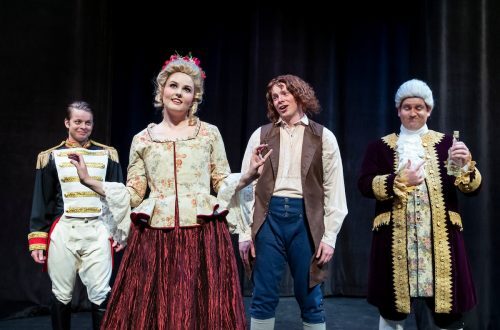 An image of four actors on stage